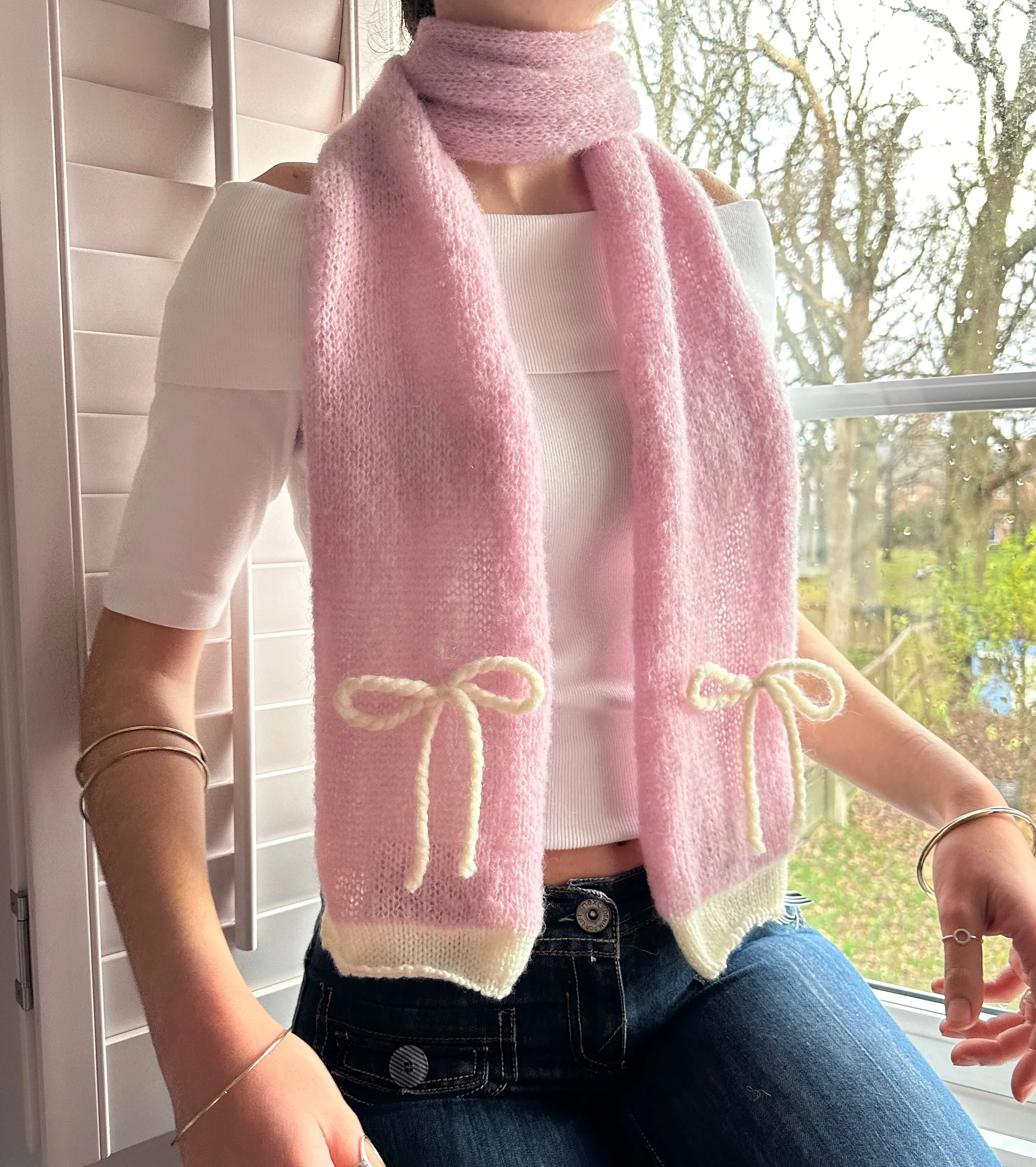 Handmade knitted baby pink and cream mohair bow scarf