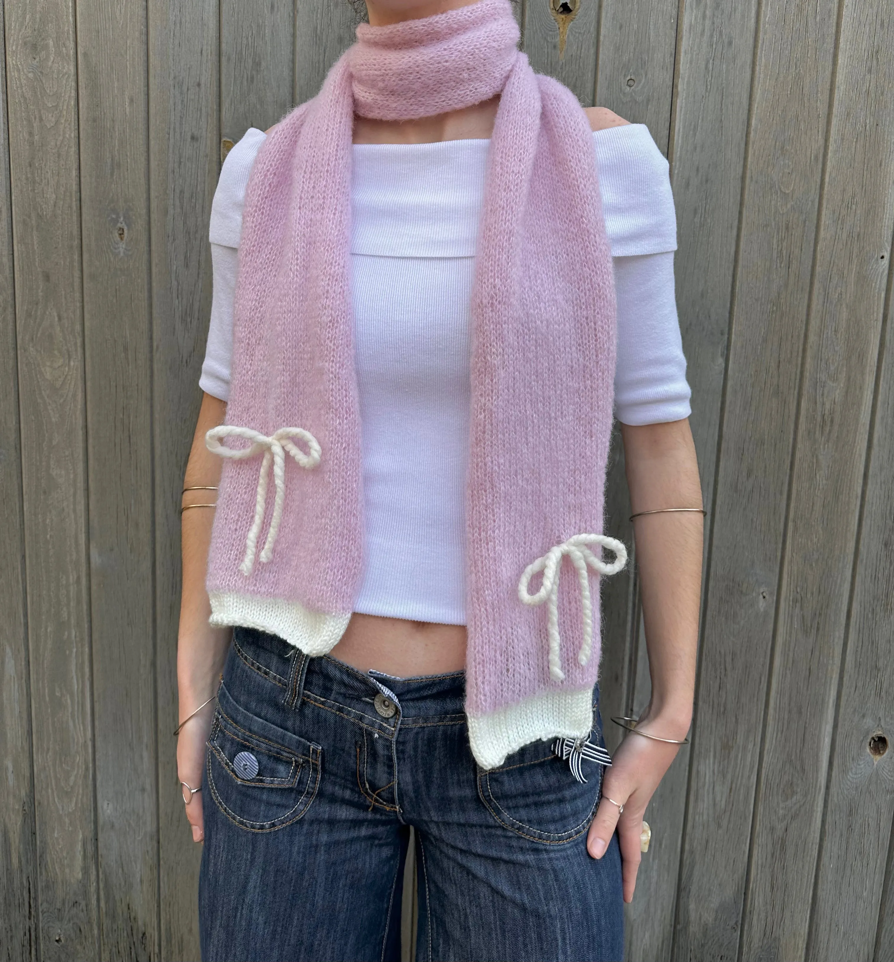 Handmade knitted baby pink and cream mohair bow scarf