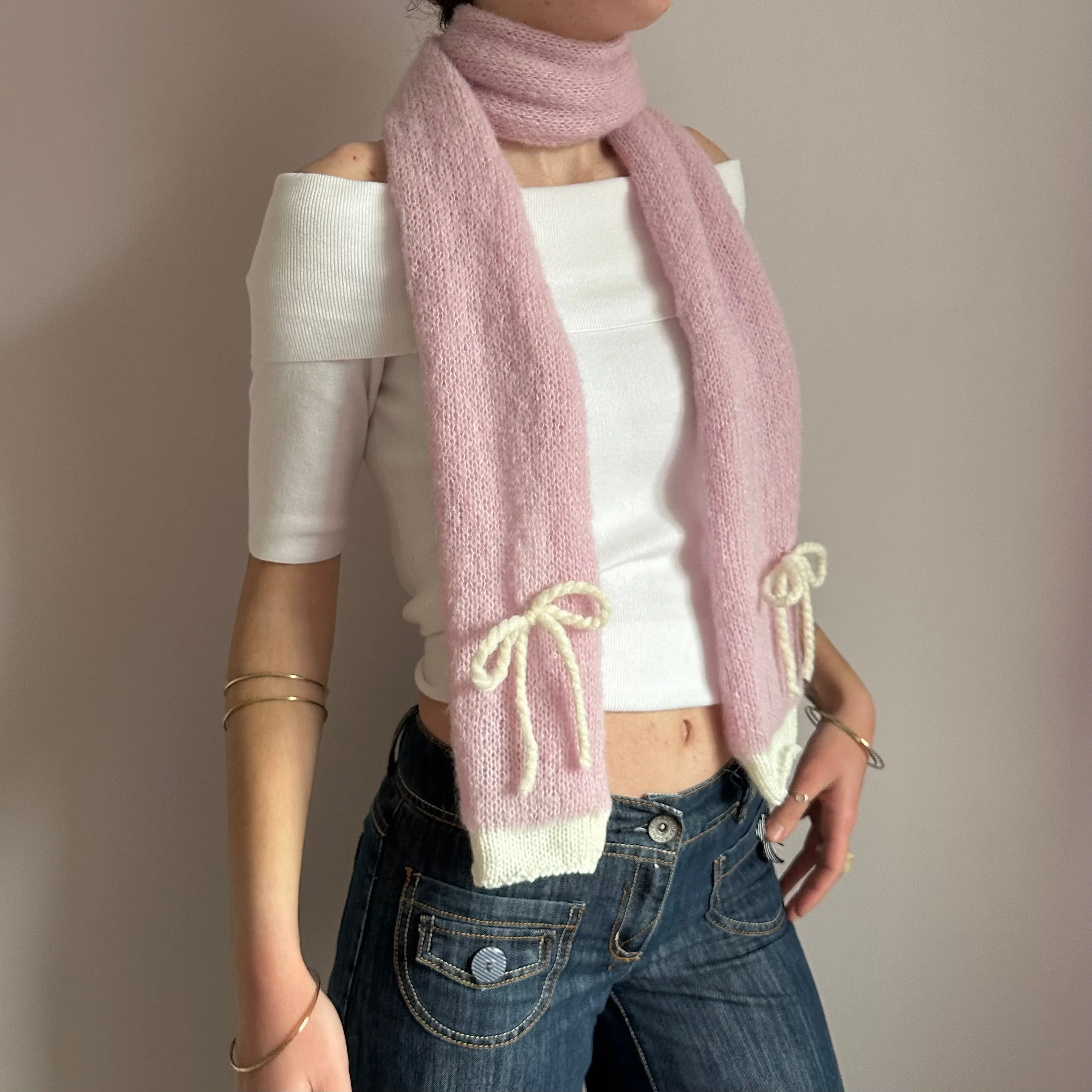 Handmade knitted baby pink and cream mohair bow scarf